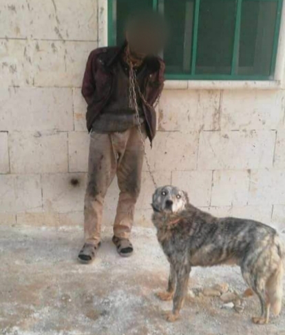 من وسائل التعذيب .. إطلاق كلاب تنهش أجساد المعتقلين في سجون الفصائل الموالية لتركيا بعفرين