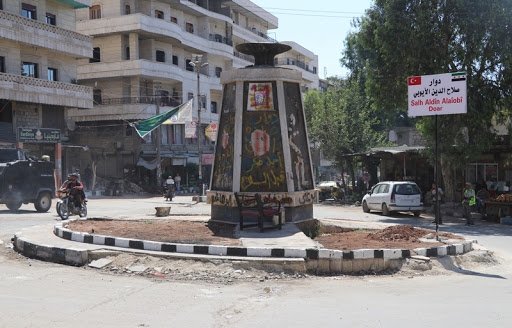 ميليشيا اللواء 112 تمنع استثمار ممتلكات الأهالي وتحتجز منازل المهجرين قسراً في بعدينا